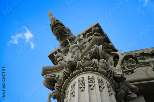 Kyiv, Ukraine - July 6, 2018: House with chimeras against blue sky. Art Nouveau building with sculptures of mythical animals. The most original creation of architect Vladislav Gorodetsky in Kiev. photo