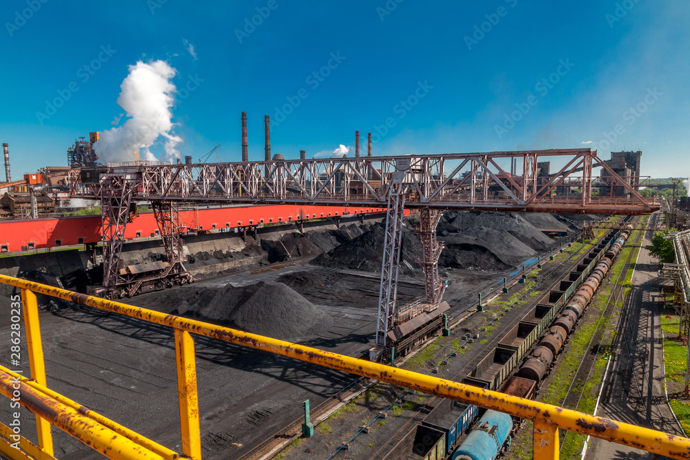 Industrial landscape on a sunny day. Coal loading