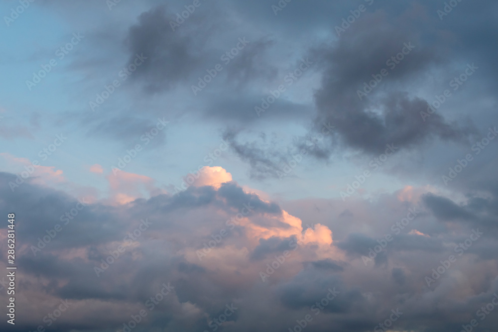 Obraz premium Cloudy sky background. Black clouds Black clouds are approaching white and black cloud surface at sunset. 