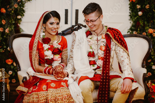 Schilderij op canvas Happy indian brides rejoice in the day of their wedding