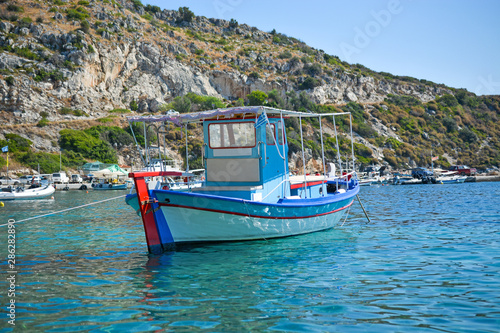 Small fishing boat on harbor