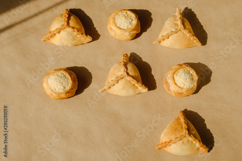 tic tac toe with food. Tatar pastries, triangles and gubadiya photo