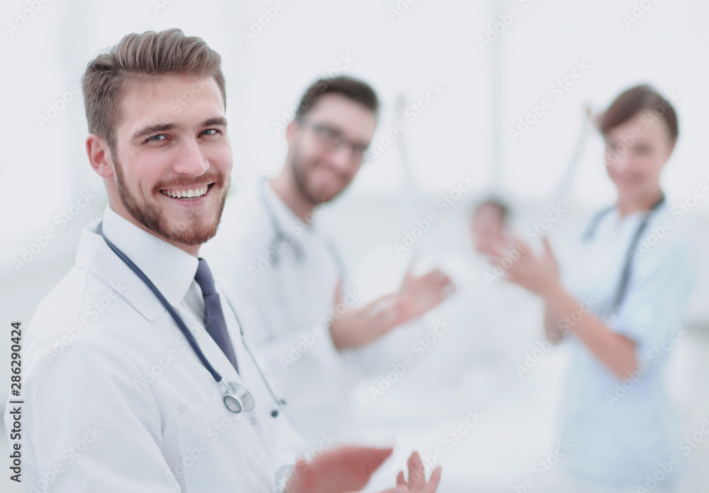 Doctors clapping hands and applauding on consent Doctors clapping hands and applauding on consent