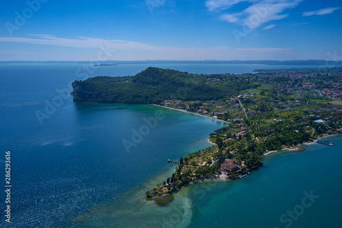 Aerial photography with drone  Rocca di Manerba in Garda lake Italy.