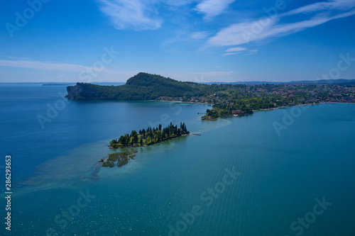 Aerial photography with drone, Rocca di Manerba, Isola di San Biagio in Garda lake,Italy.