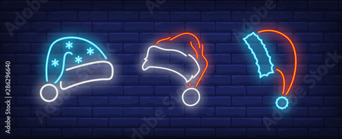 Santa Claus hats neon signs set