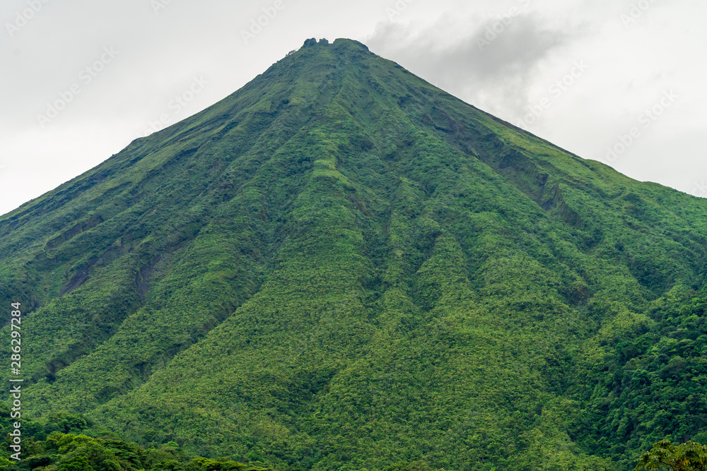 Arenal Volcano, which has an almost perfect cone shape, is one of the biggest tourist attraction in Alajuela, Costa Rica