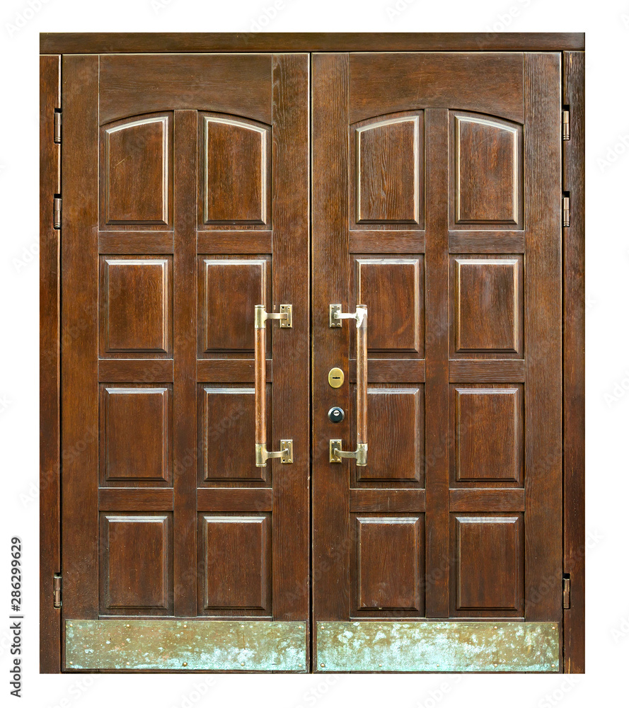 New big wooden oak doors with brass handles. New big wooden oak doors with brass handles.