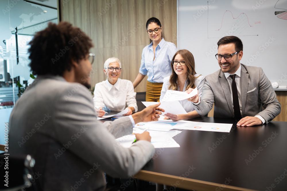 Business colleagues in conference meeting room presentation