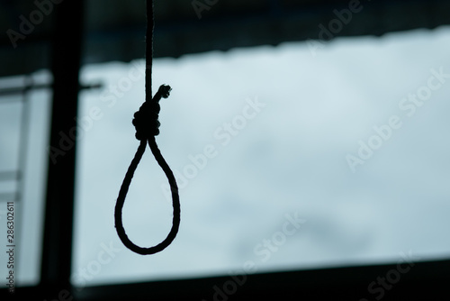 Tapeta Silhouette of Hangman's noose knot. commit suicide concept.