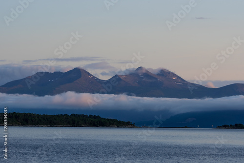 Landscape of mountains coming out from the sea in Molde  a beautiful view from of the fjord.