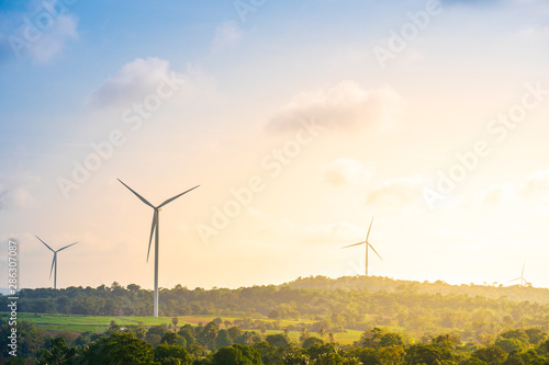 Green energy concept, eco power. Wind turbine located along the hill with the wind blowing all the time. Can produce renewable energy as well. Considered a clean energy.