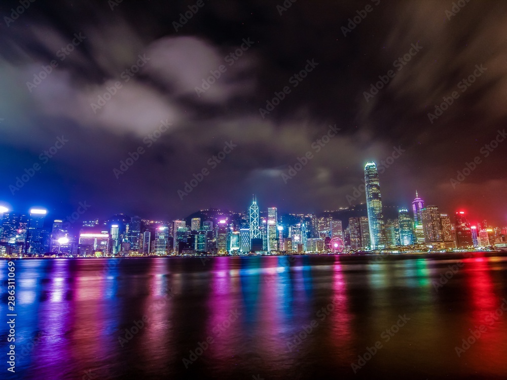 Hong Kong Skyline at night with water in the foreground
