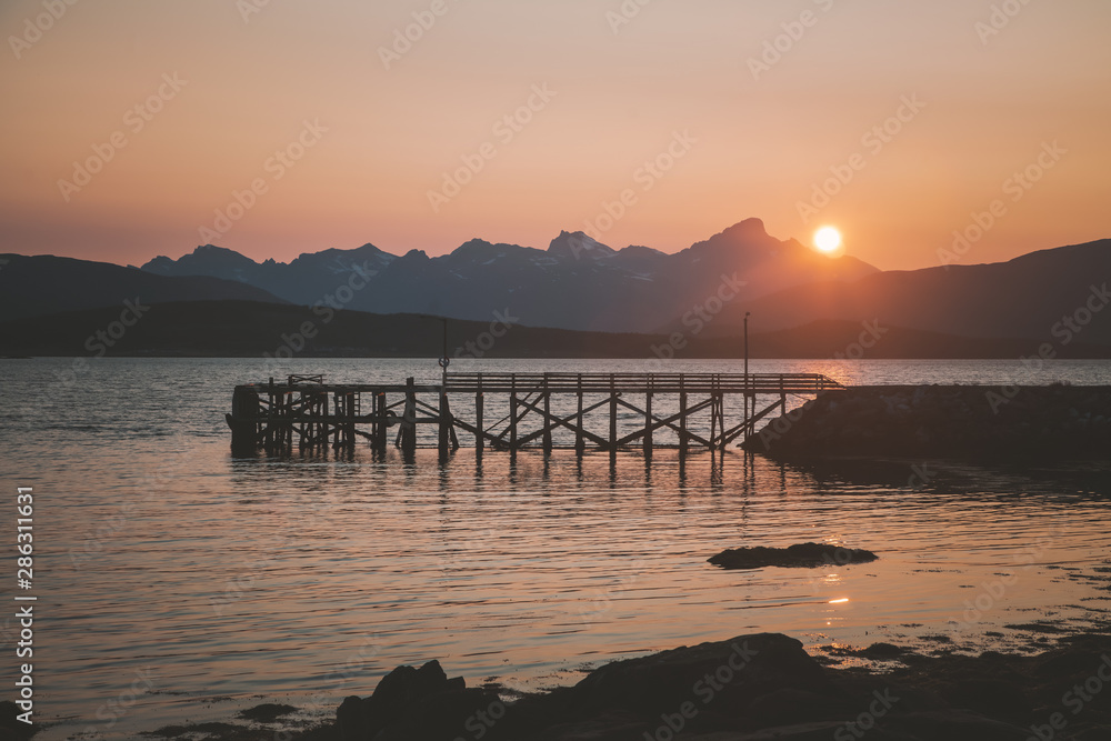 Fototapeta premium Telegrafbukta in Tromso Norway, Midnight sun and sunset colors on the beach