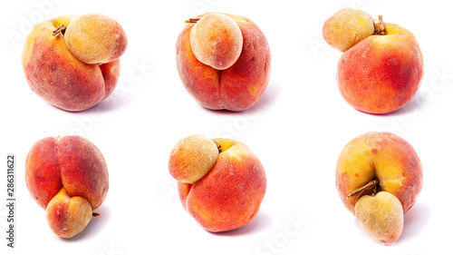 Trendy ugly food set. Peach fruits isolated on white background. Misshapen produce, food waste problem concept.