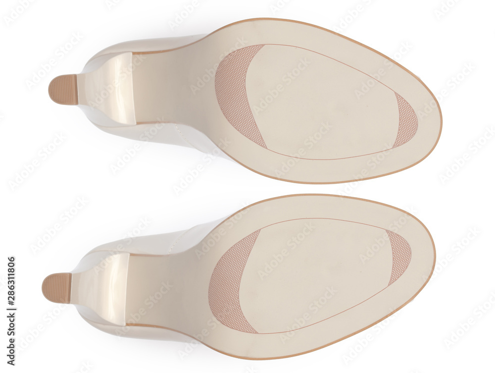 Bottom of shoes, isolated on white background. Bottom of shoes, isolated on white background.
