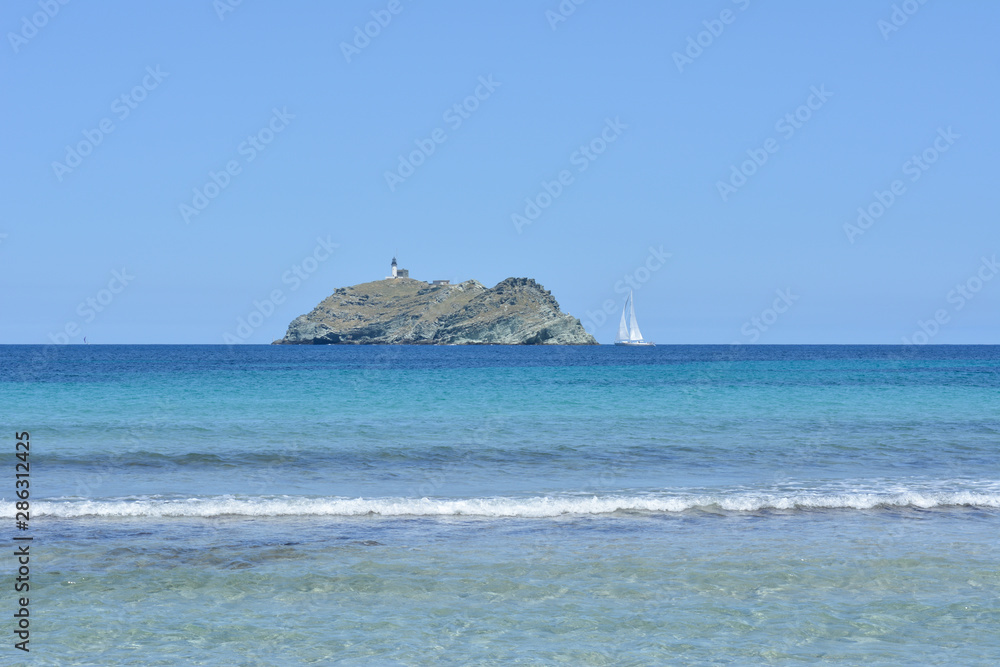Barcaggio beach and Giraglia island. Cap Corse, Corsica, France