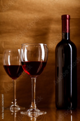 Bottle and Glasses of Red Wine