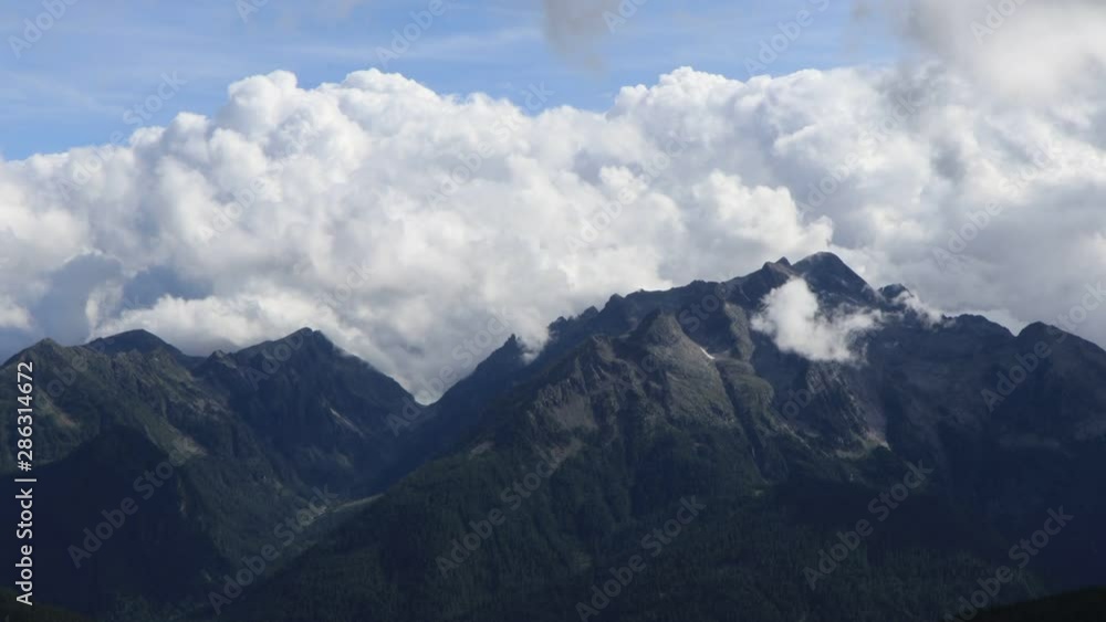 time lapse of a landscape in the italian alps mountains with clouds moving, Italy time lapse of a landscape in the italian alps mountains with clouds moving, Italy