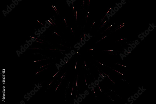 isolated fireworks on a black night background