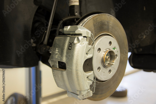 The braking system of a modern car. Brake Disc. Brake Caliper. Close-up.