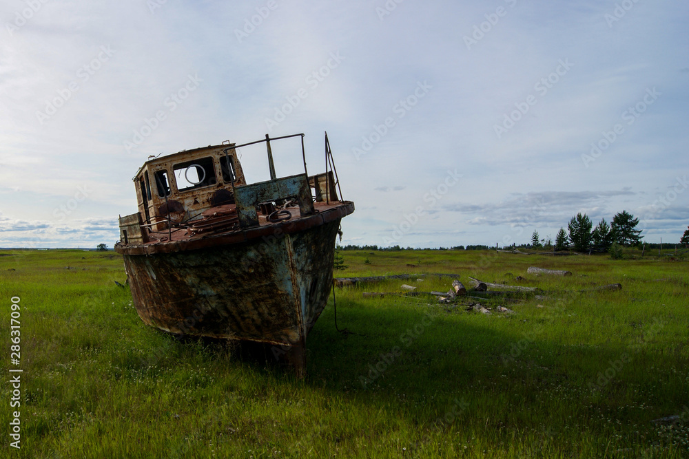 old boat is on land