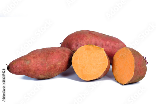 Fresh Sweet potato tubers on white background