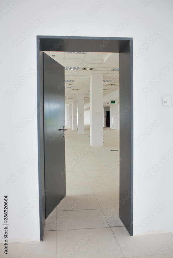 Interior of empty corridor in new office Interior of empty corridor in new office