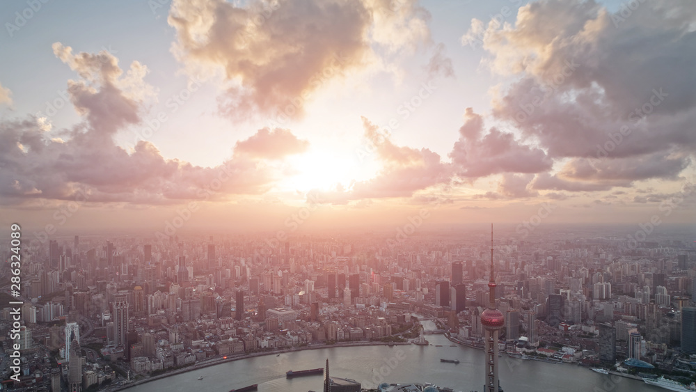 Shanghai China cityscape overlooking the Financial District and Huangpu River, high angle view of shanghai panorama with beautiful sunset glow.