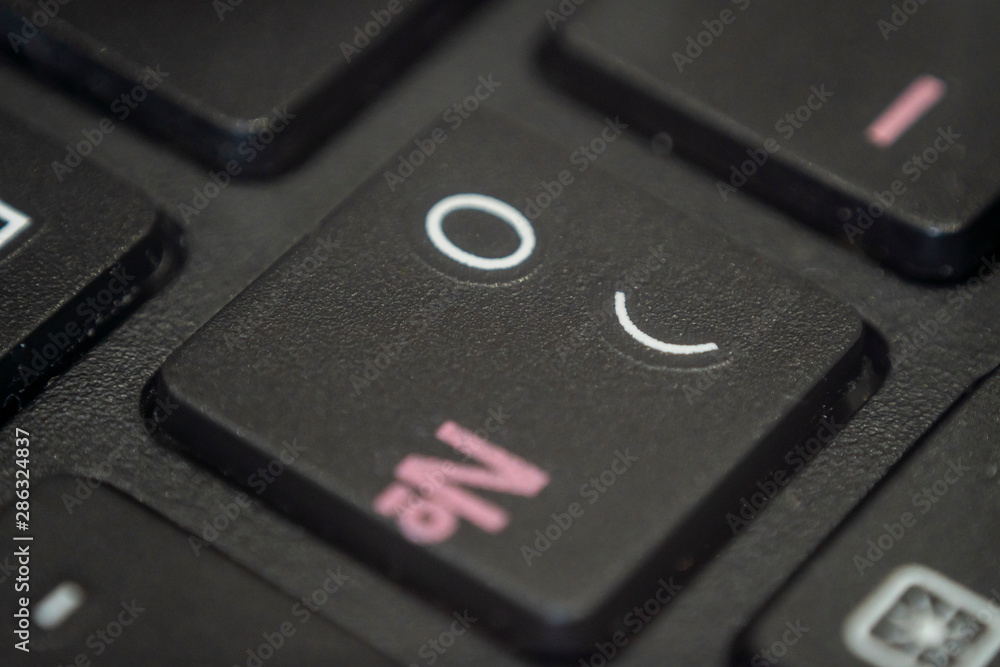 Close up of the round bracket and zero key on a keyboard Close up of the round bracket and zero key on a keyboard