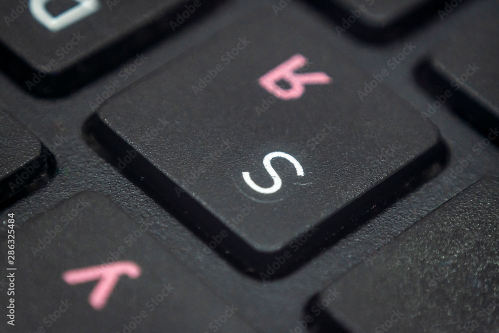 Close up of the letter S on a keyboard Close up of the letter S on a keyboard