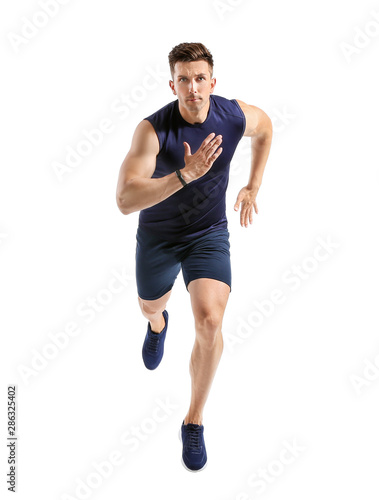 Running young man on white background