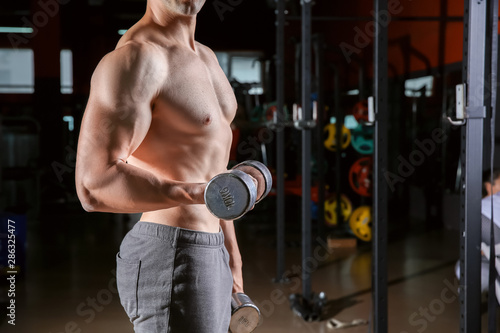 Muscular Man Performing Bic...