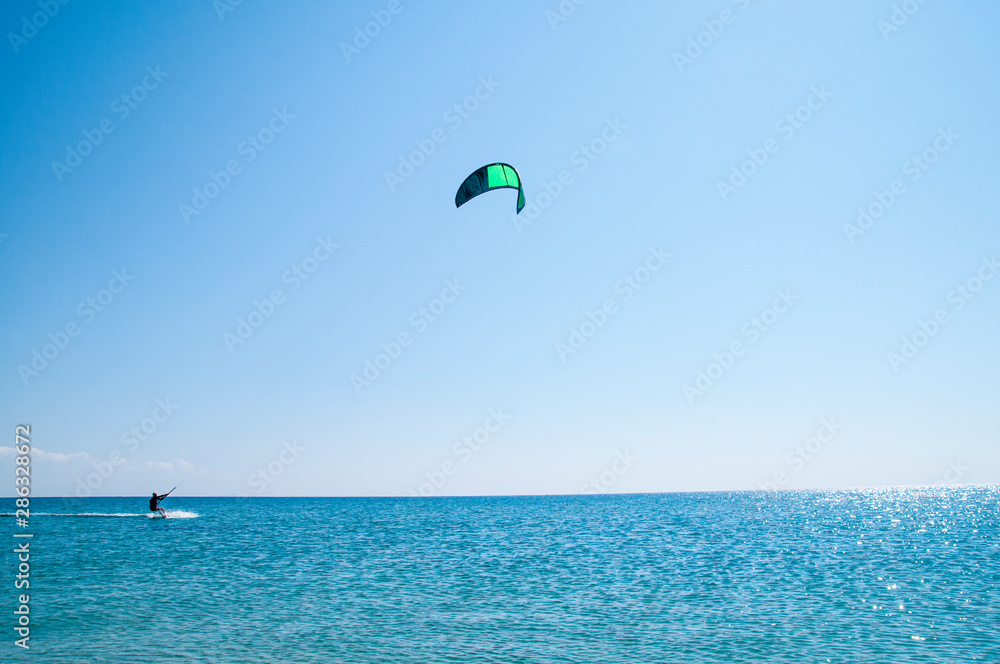 Kitesurfing Kiteboarding action photos man among waves quickly goes. Kitesurfing Kiteboarding action photos man among waves quickly goes.