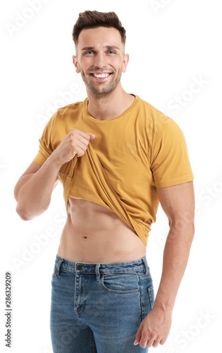 Handsome muscular man on wh...
