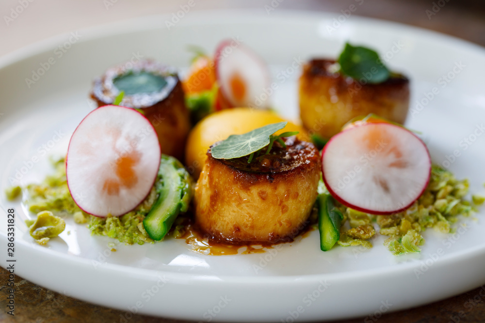 King oyster mushroom scallops, confit yolk and wasabi peas crumbs King oyster mushroom scallops, confit yolk and wasabi peas crumbs