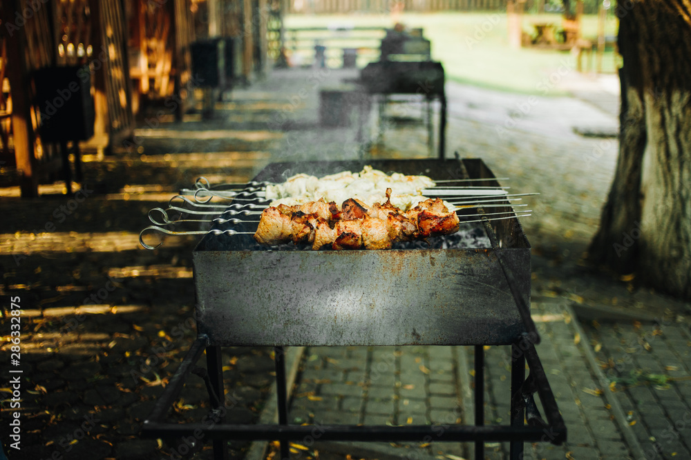 Grilled pork kebab on the grill