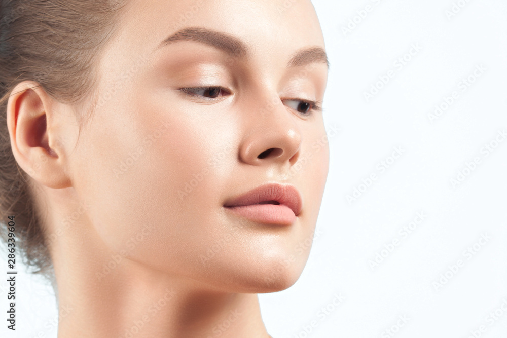 Young beautiful woman with clean perfect skin close-up Young beautiful woman with clean perfect skin close-up