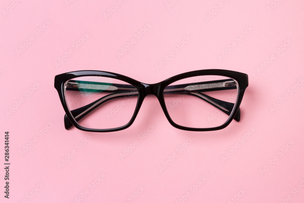 Stylish fashionable glasses on creative pink background. Stylish fashionable glasses on creative pink background.