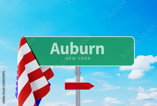 Auburn – New York. Road or Town Sign. Flag of the united states. Blue Sky. Red arrow shows the direction in the city. 3d rendering photo