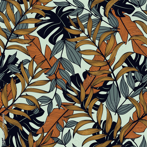 Colorful seamless pattern with dark and yellow tropical plants and leaves. Floral Botanical texture. Printing, textile, fabric. Trending vector design. Unique tropical ornaments. © EltaMax99