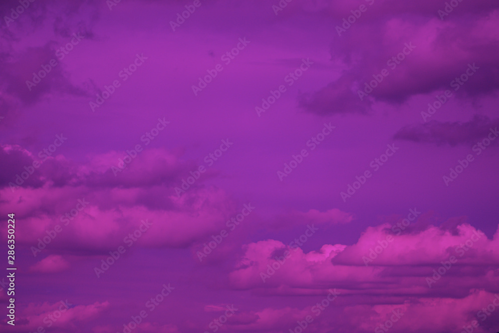 Sky and cloudy with beautiful purple color background.Subtle background Pastel of cloud.