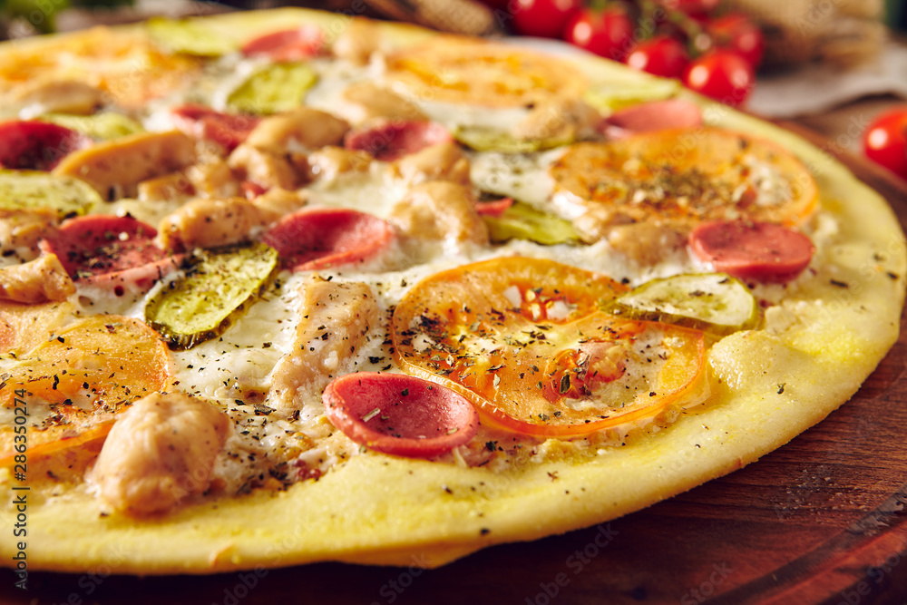 Homemade pizza on wooden table top view Homemade pizza on wooden table top view
