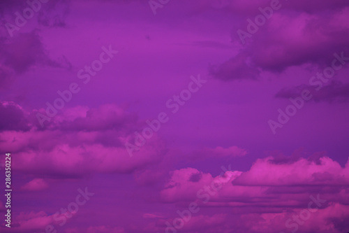 Sky and cloudy with beautiful purple color background.Subtle background Pastel of cloud. © alohapatty