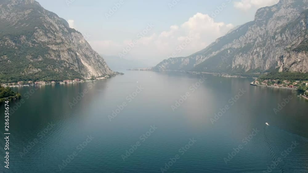 an aerial view over to a swan on Lake Como, Lecco an aerial view over to a swan on Lake Como, Lecco