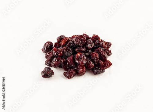 a group of sweetened cranberries on white background