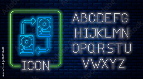 Glowing neon A fixed data storage device hard disk with arrows, data copy icon isolated on brick wall background. Data exchange with hard disk drive. Neon light alphabet. Vector Illustration