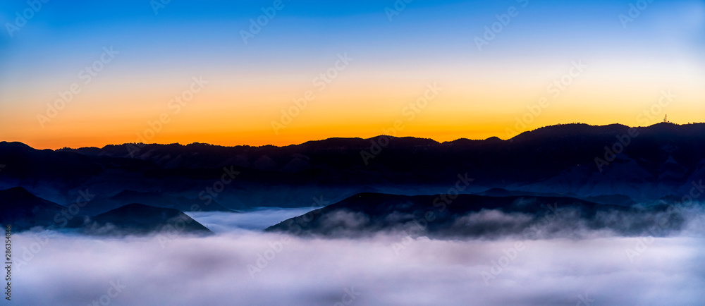 Sunrise panorama with Fog in Valley