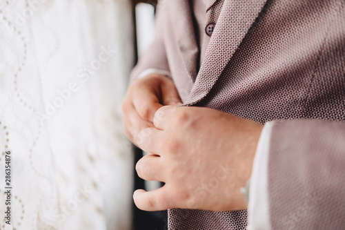 groom meeting, details, jacket, shoes, watches and buttons on the wedding day © pressahotkey