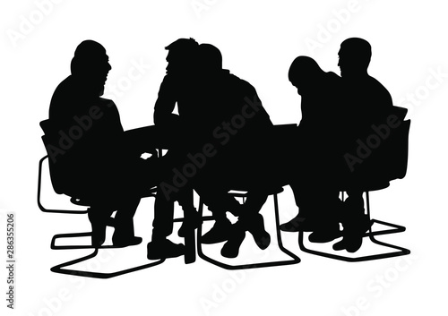 Young business people sitting and talking about new idea. IT partners meeting. Break relaxation after work in restaurant. Desk table chairs.  Group of friends drinking in bar after work. Social live.